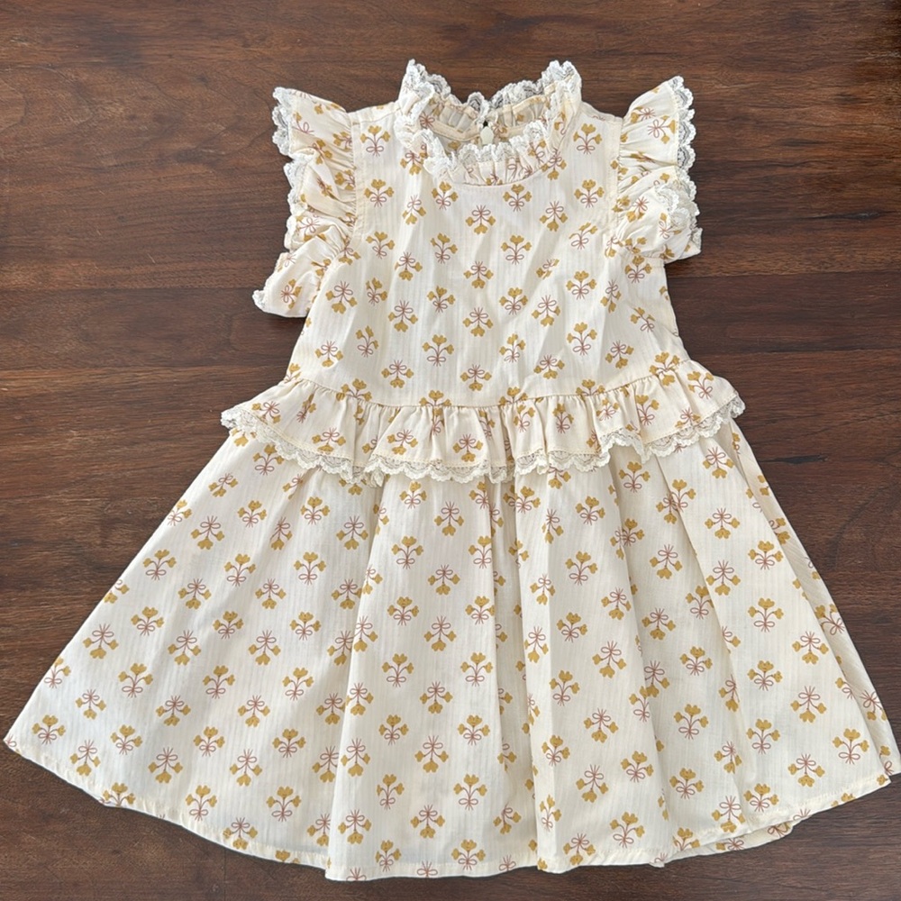 Toddler lace trimmed cotton dress.